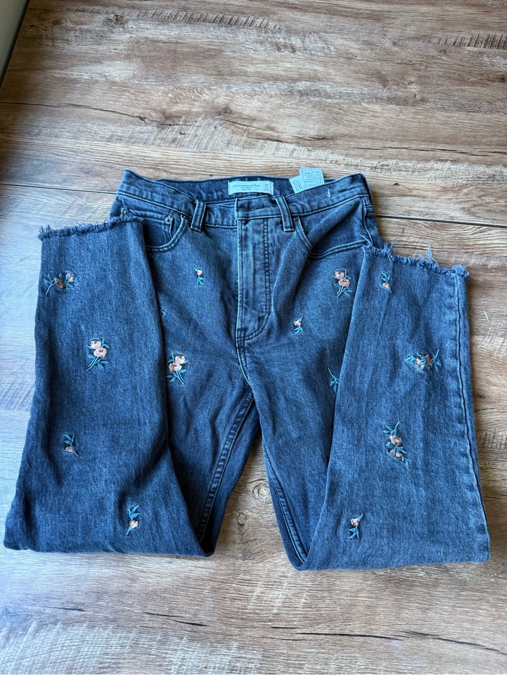 Abercrombie & Fitch Dark Gray Straight-Leg Jeans with Pink Floral Embroidery.